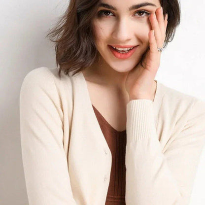 Stylish v-neck cardigan in various colors, featuring a flattering design and luxurious cashmere-rich composition for the modern Kiwi woman