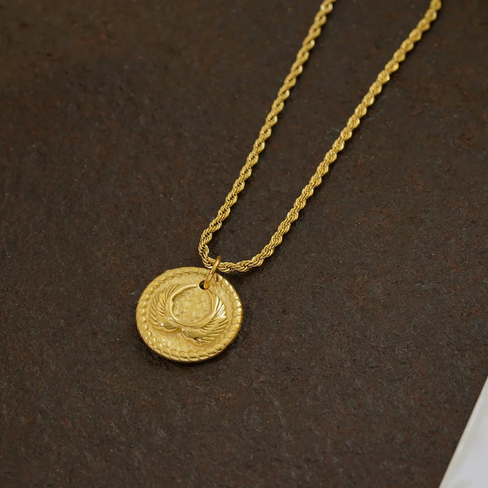 A minimalist, layered titanium steel necklace with an adjustable chain length and a 2 cm pendant, perfect for elevating your everyday style.