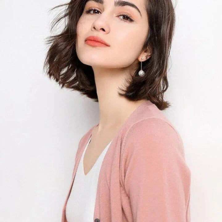 Stylish v-neck cardigan in various colors, featuring a flattering design and luxurious cashmere-rich composition for the modern Kiwi woman