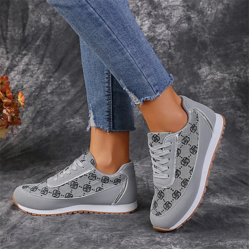 Stylish flower-printed lace-up sneakers with durable rubber soles and breathable materials, perfect for Kiwi women's active lifestyles.