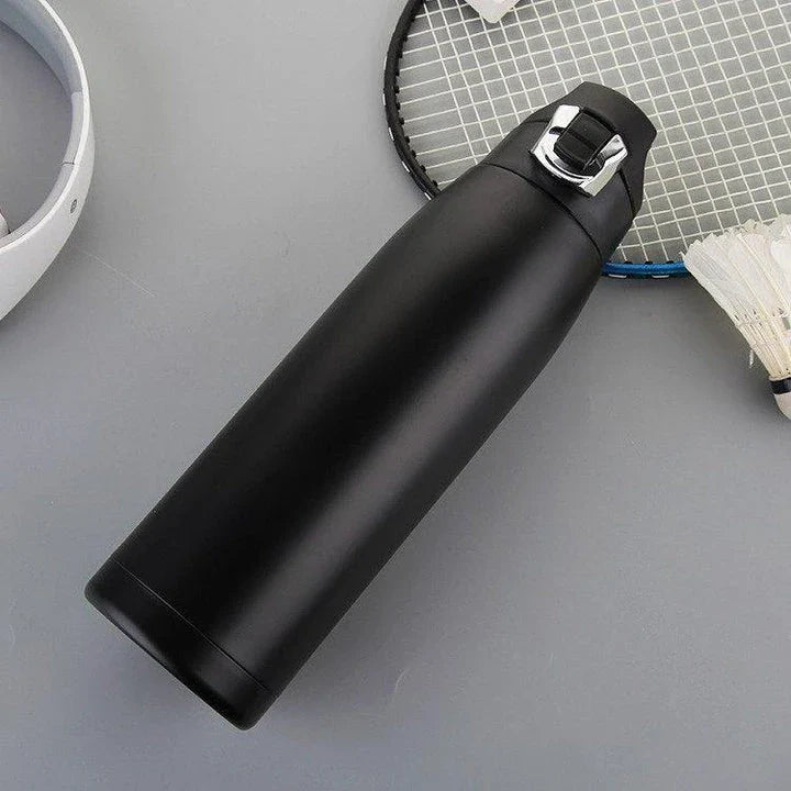 Premium stainless steel insulated thermos bottle with 900ml capacity, vacuum-sealed design, and eco-friendly BPA-free materials