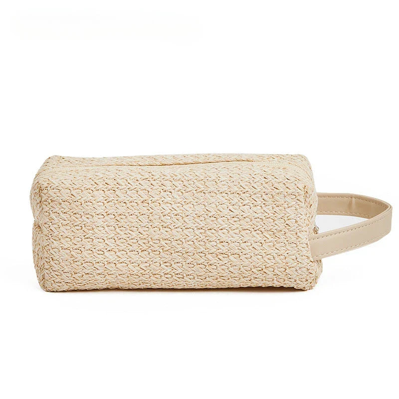 A stylish and practical cosmetic bag made from eco-friendly straw material with a unique knitting pattern, designed for the modern Kiwi woman.