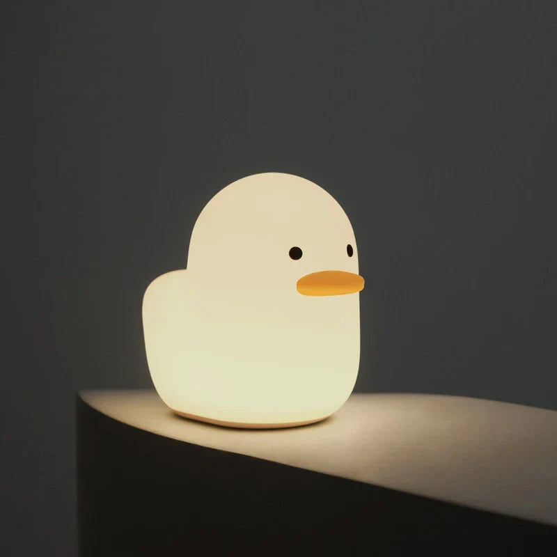 Enchanting Dull Duck LED Night Light with soft silicone body and customizable dimmable lights, perfect for bedrooms and kids' rooms