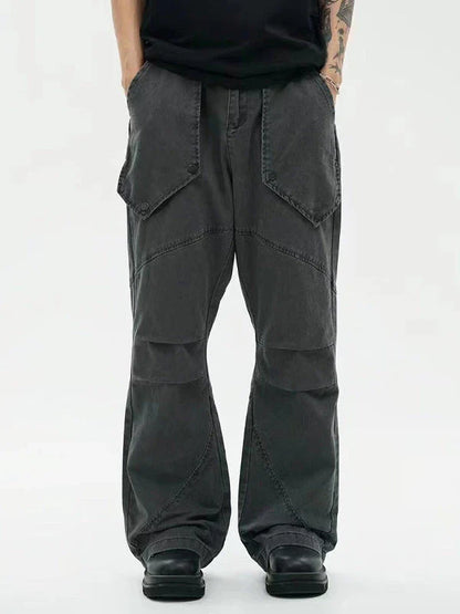 Black washed micro-flared trousers with pleated design and large pockets, perfect for the modern Kiwi lifestyle