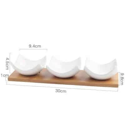 Stylish ceramic snack trays with natural wood pallet, perfect for serving nibbles and entertaining in Kiwi-style homes