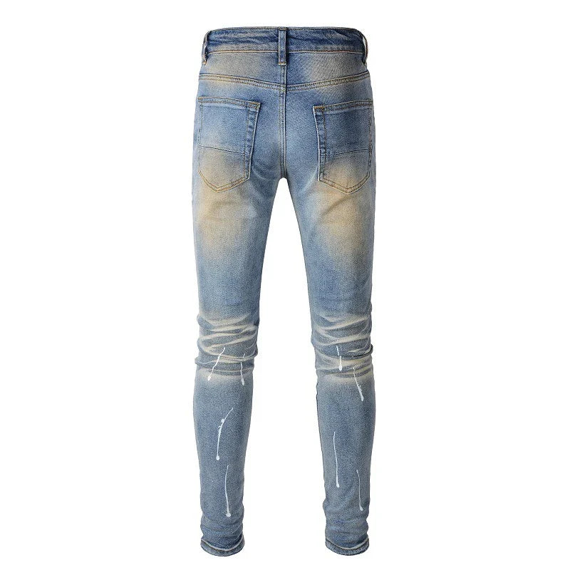 Vintage-inspired jeans with rhinestone and ink splash detailing, perfect for the modern Kiwi lifestyle