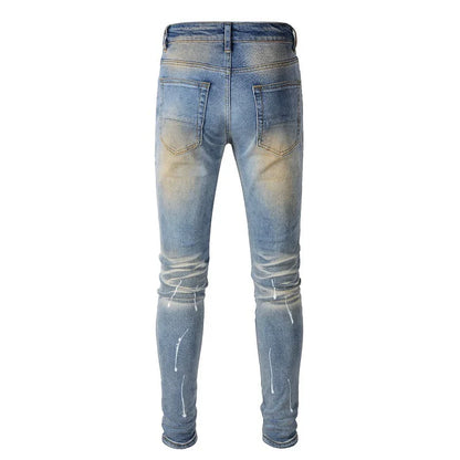 Vintage-inspired jeans with rhinestone and ink splash detailing, perfect for the modern Kiwi lifestyle