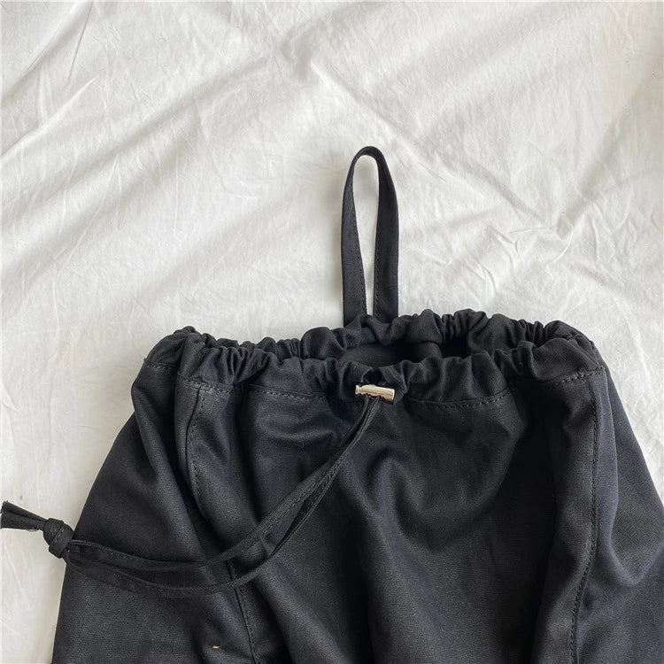 A stylish drawstring bucket bag made of premium polyester fabric, available in a variety of on-trend colours to complement your New Zealand fashion