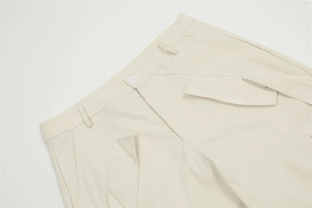 Stylish black overalls with pleated pockets, designed for the active Kiwi lifestyle