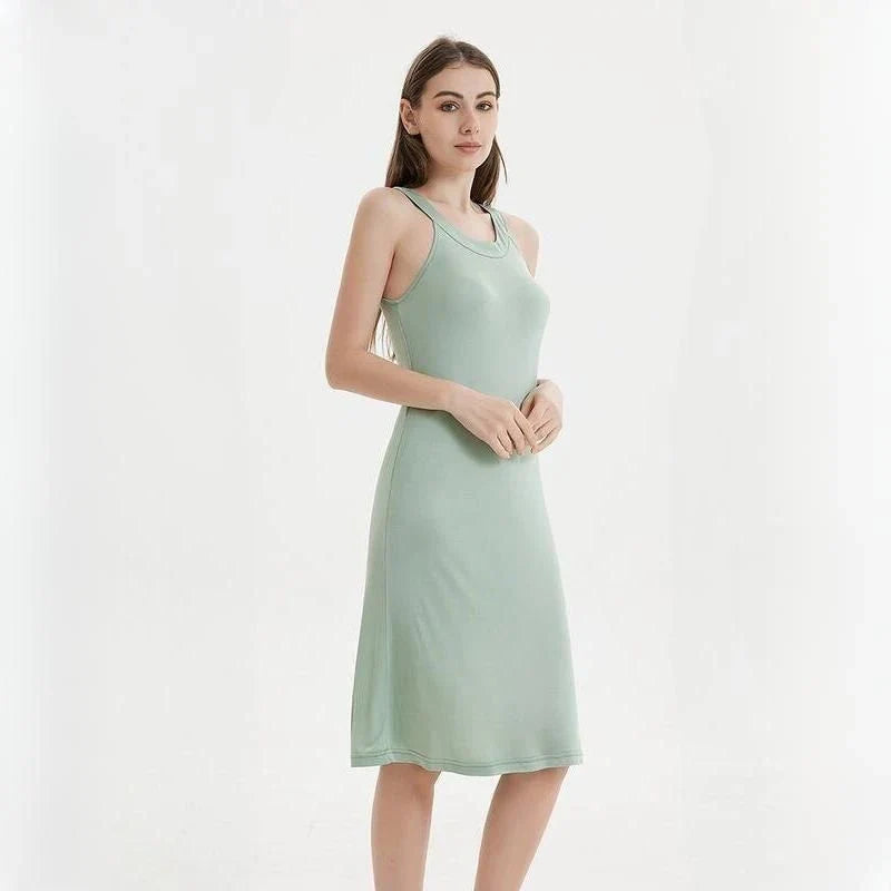 Elegant silk-blend halter midi dress in green and white, perfect for Kiwi women's summer fashion