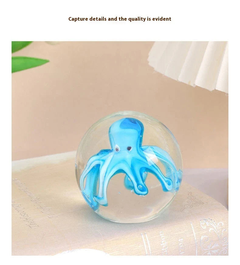 Handcrafted glass octopus windshield washer fluid ornament in ocean blue and tea brown colours, made in New Zealand