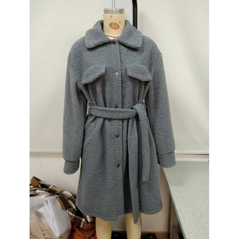 Stylish mid-length plush trench coat with belted waist, available in black, blue gray, and caramel colors