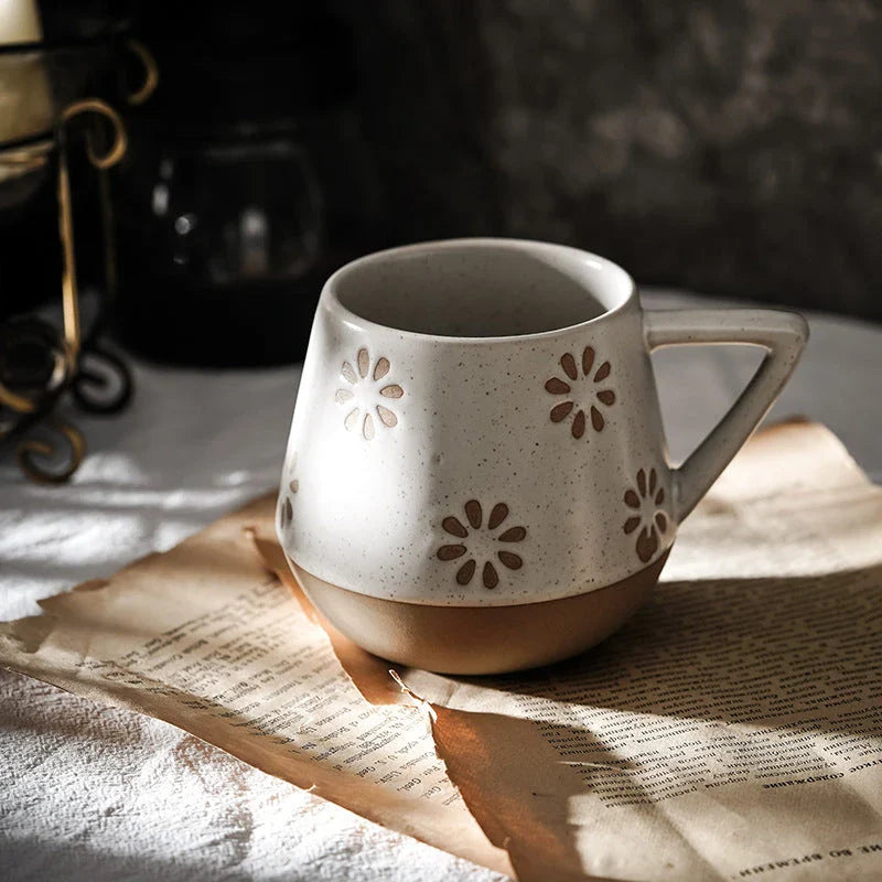 Stylish hand-painted ceramic mug with unique floral, geometric, or abstract designs, perfect for elevating your daily beverage experience.