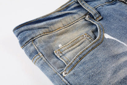 Vintage-inspired jeans with rhinestone and ink splash detailing, perfect for the modern Kiwi lifestyle