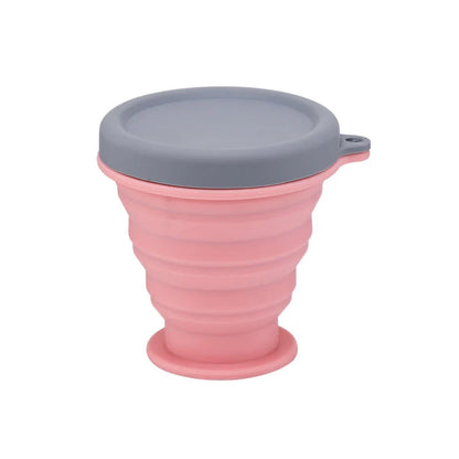 Compact, collapsible silicone cup in various colors, perfect for Kiwi travelers and adventurers