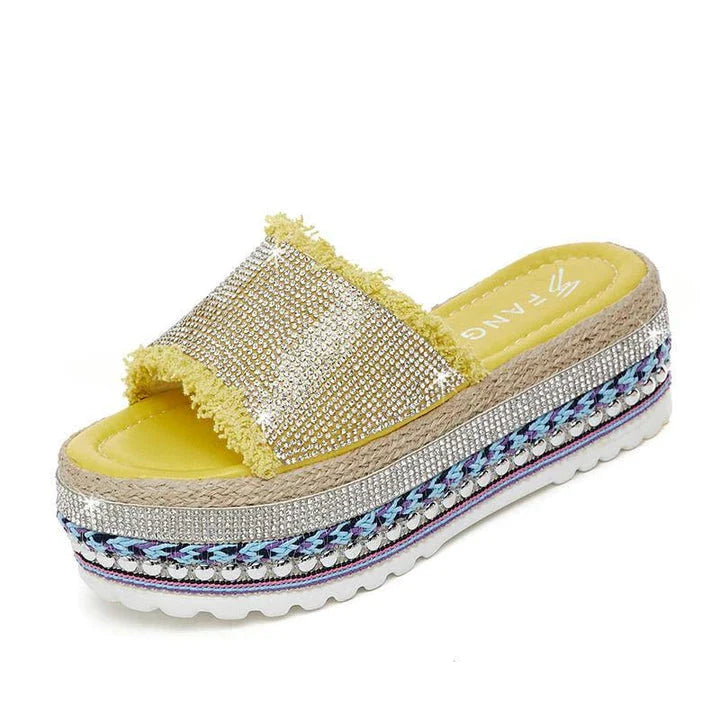 Pair of Kiwi-made Sponge Cake Slippers in beige, featuring a thick, cushioned sole for comfort and a subtle height boost