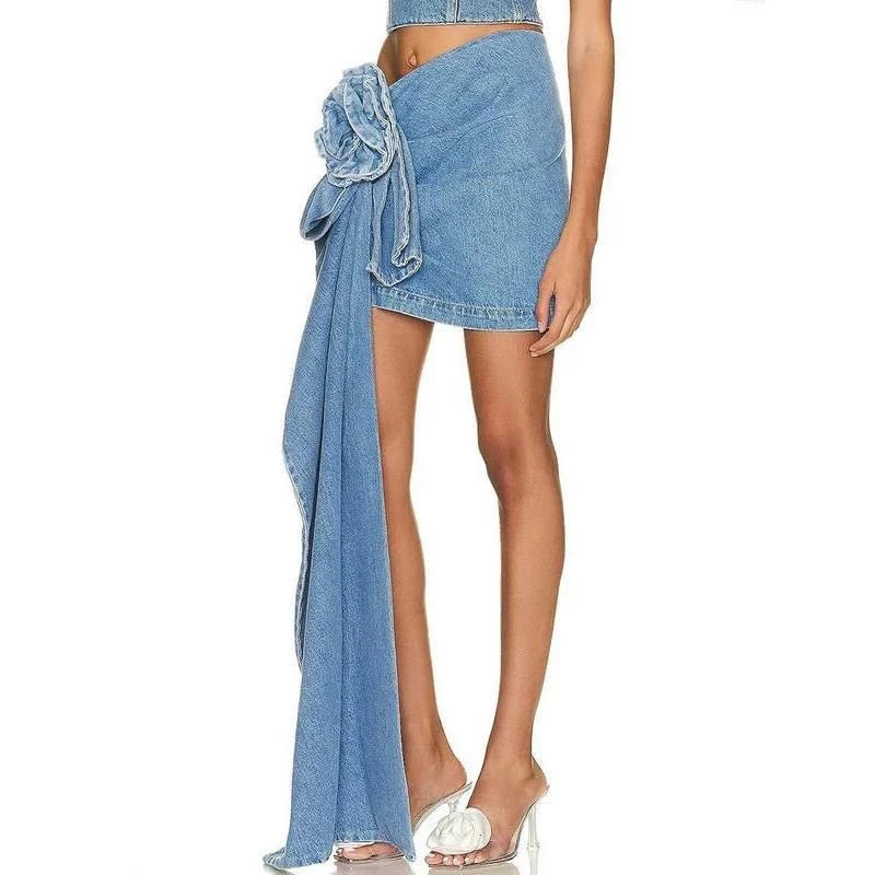 Stylish high-waist blue denim skirt with a 3D rose floral detail, perfect for summer fashion