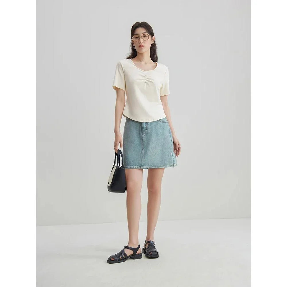 Chic high-waisted denim skirt with a flattering A-line silhouette, perfect for Kiwi summer days