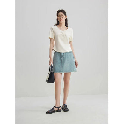 Chic high-waisted denim skirt with a flattering A-line silhouette, perfect for Kiwi summer days