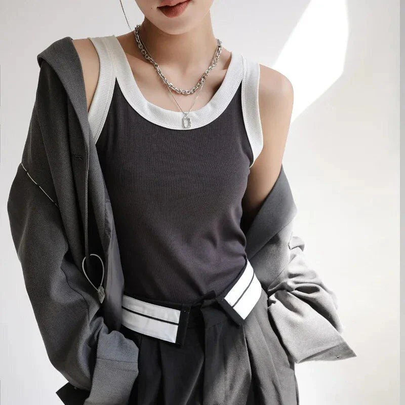 Knitted ribbed cotton camisole in army green color, designed for Kiwi women with a flattering, versatile silhouette.