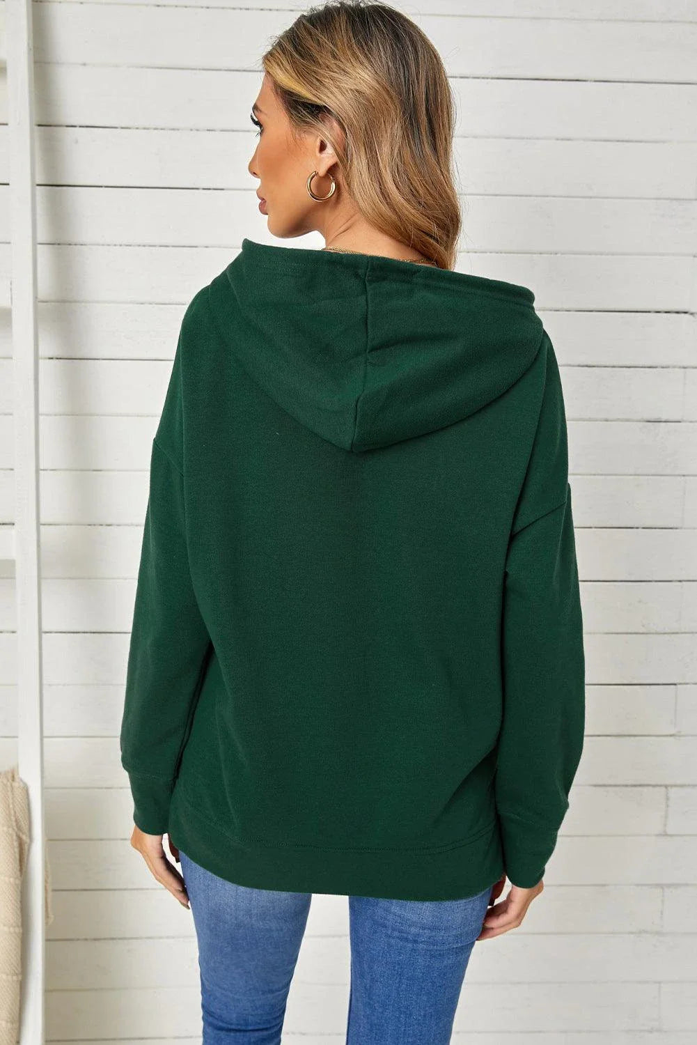 Comfortable drop-shoulder hoodie with stylish slit in green color, featuring a soft, stretchy fabric blend and practical drawstring closure