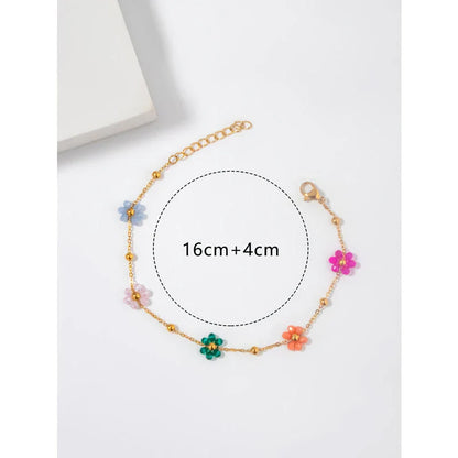 Vibrant, colorful flower-beaded stainless steel bracelet with adjustable chain and link design