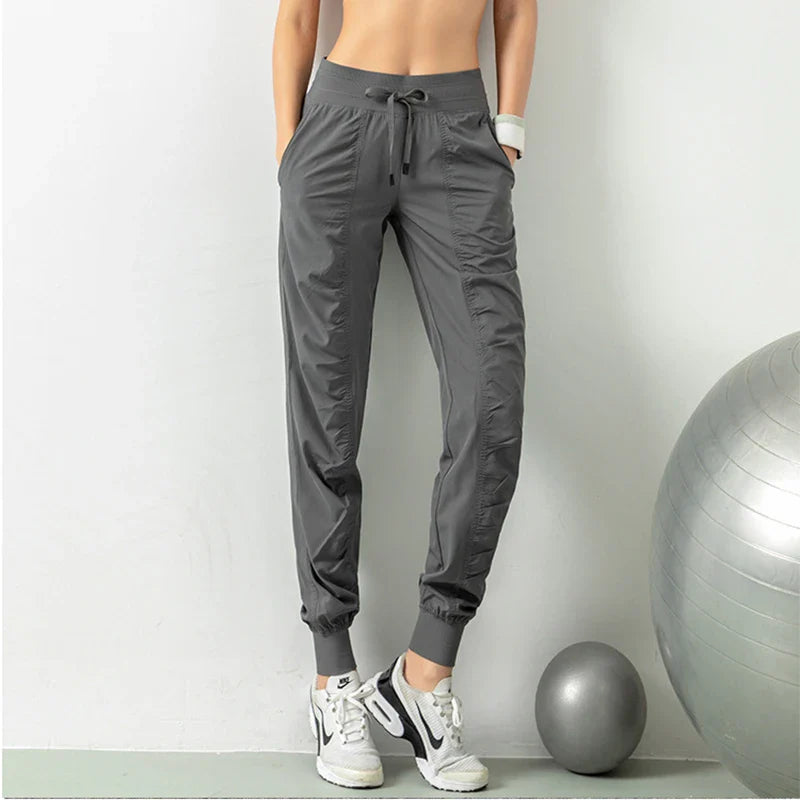 Comfortable and versatile sports pants for active Kiwi women, featuring a relaxed fit, drawstring waist, and convenient pockets.