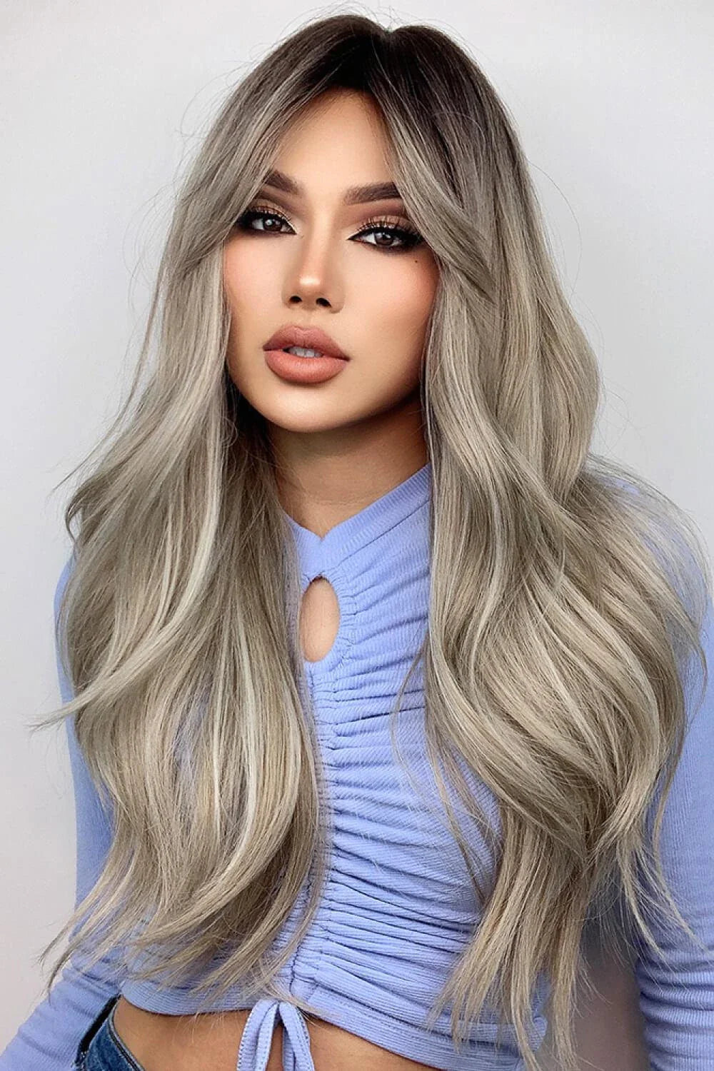 Stylish 26-inch long wave synthetic wig in silver/gray color with comfortable basic cap construction