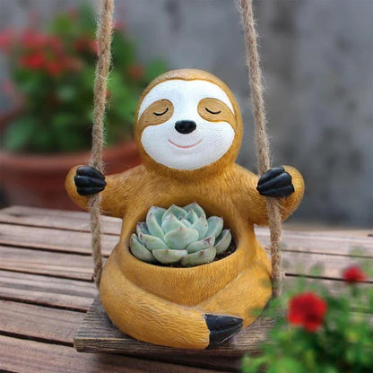 Charming Hanging Sloth Planter in resin material with a vibrant, glossy finish for home and garden decor