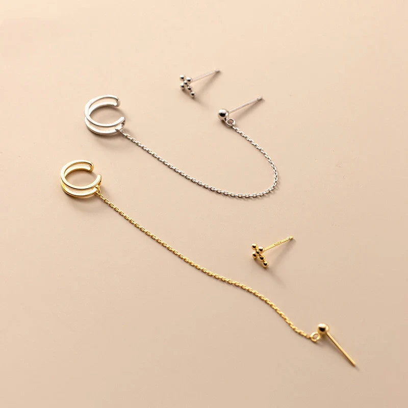 Unique one-piece sterling silver earring and ear clip set designed by New Zealand artist Xia Chunyin
