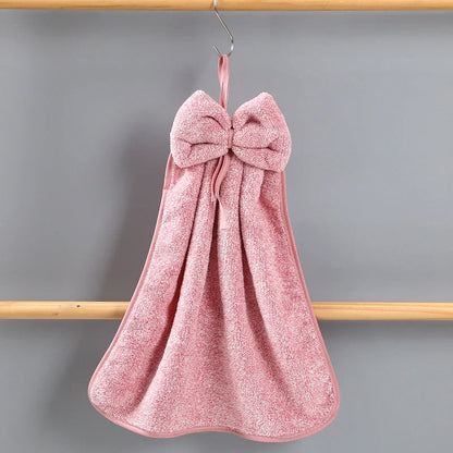 Soft, absorbent coral velvet hand towels with a unique bow design, perfect for Kiwi homes