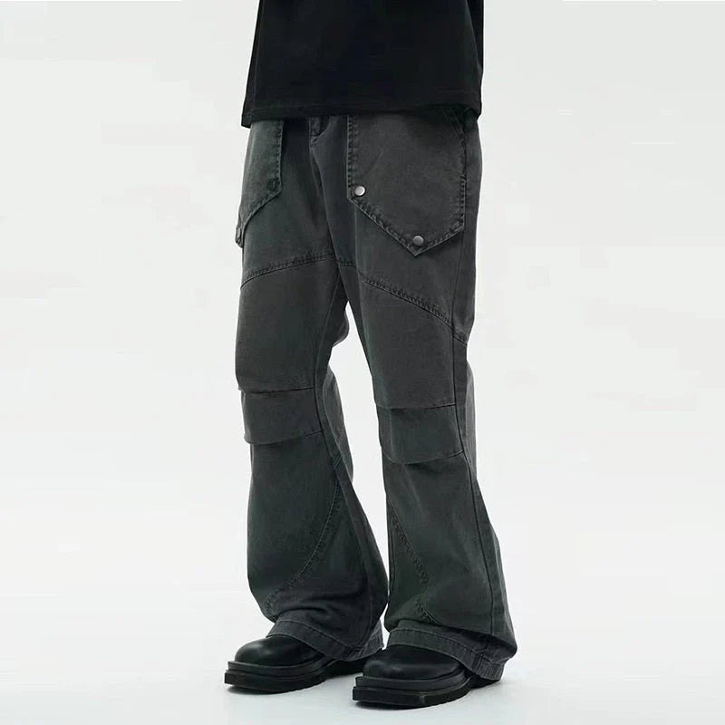 Black washed micro-flared trousers with pleated design and large pockets, perfect for the modern Kiwi lifestyle