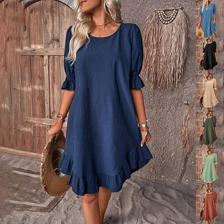 Stylish ruffle dress in a variety of colors, featuring a relaxed, straight silhouette and delicate ruffles for a touch of feminine flair.