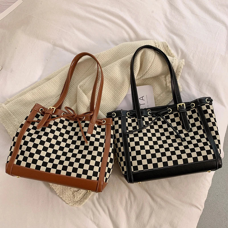 Black PU leather tote bag with a classic checkerboard pattern, perfect for everyday use in the Kiwi lifestyle