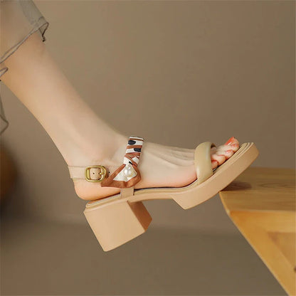 Chic open-toe leather platform sandals with adjustable buckle strap and square heel, perfect for Kiwi summer style.