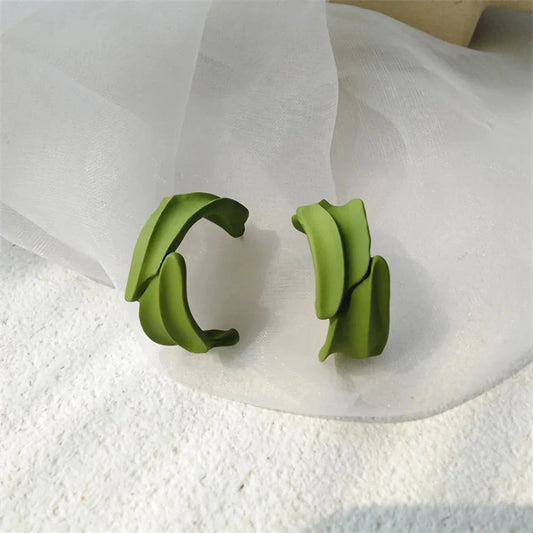 Stylish green leaf geometric drop earrings with a modern, trendy design