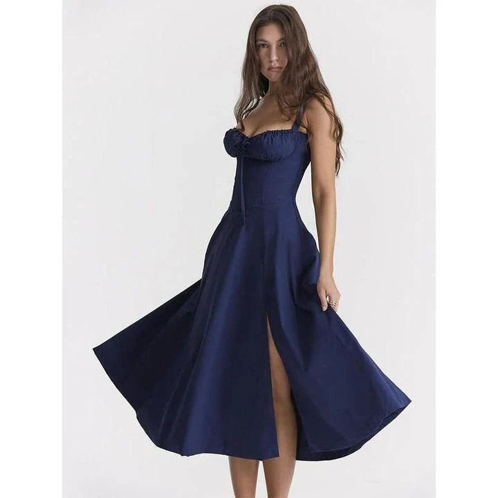 Elegant backless midi sundress in blue, featuring a high split and A-line silhouette for a flattering fit