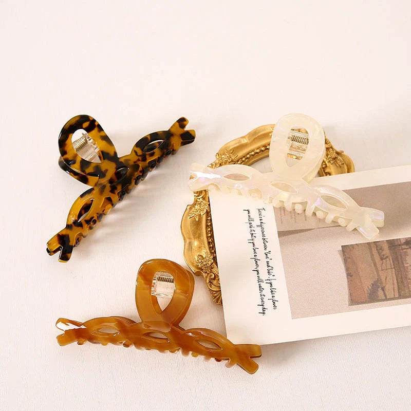 Elegant leopard print hair clip with large weave design, a stylish accessory for Kiwi girls