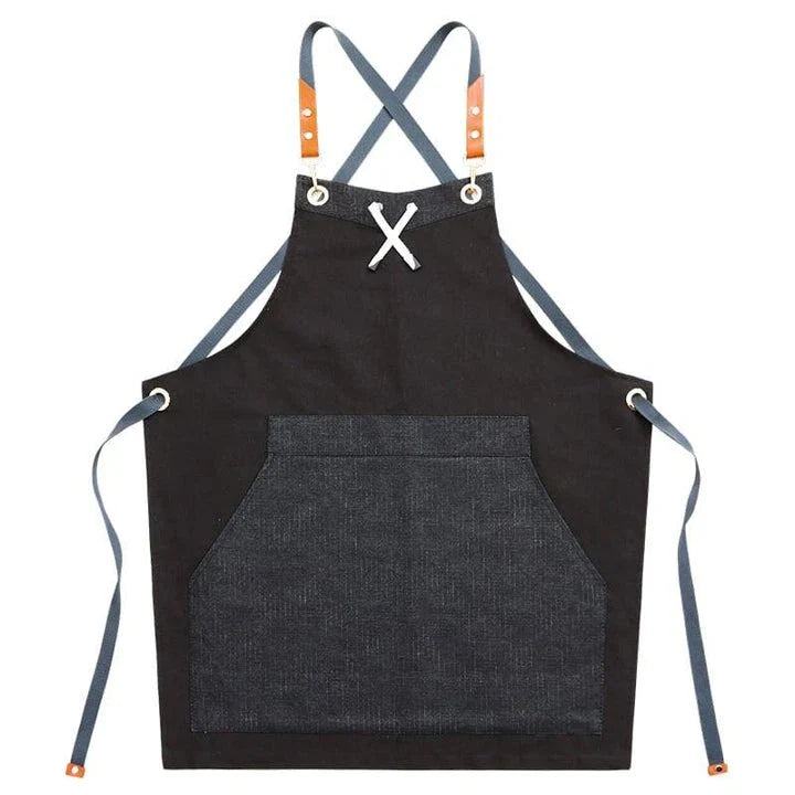 Black canvas barista apron with multiple pockets and adjustable straps, perfect for Kiwi café workers