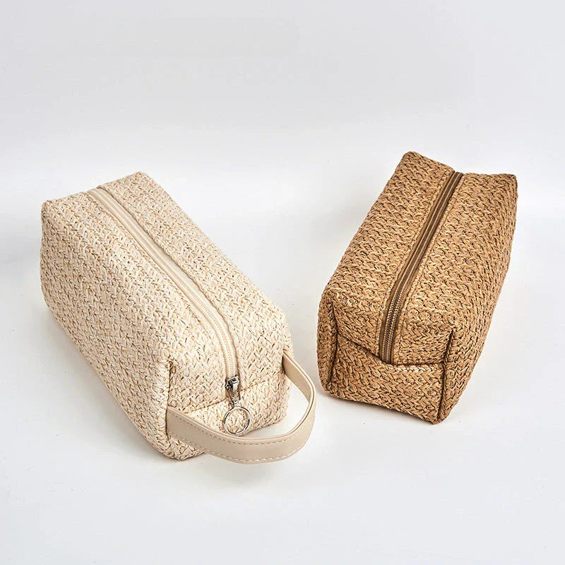 A stylish and practical cosmetic bag made from eco-friendly straw material with a unique knitting pattern, designed for the modern Kiwi woman.