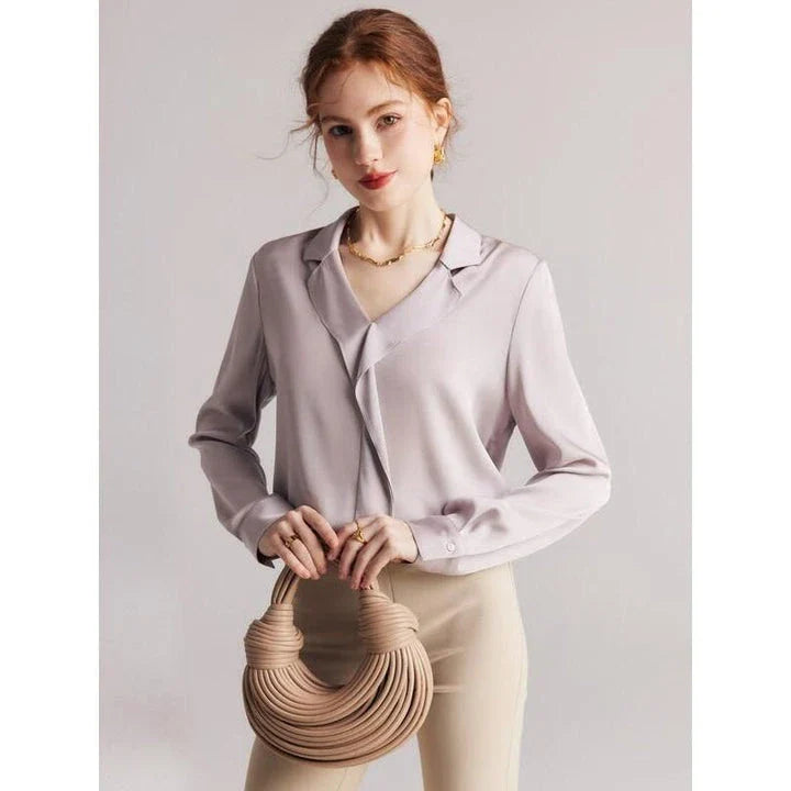 Elegant ruffled silk blouse in champagne color with V-neck design, suitable for professional or casual wear