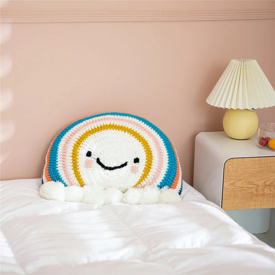 Cozy Cartoon Sunflower Cushion with Vibrant Rainbow Design and Cheerful Pompom Accents