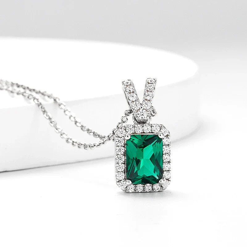 Gleaming emerald clavicle necklace with 925 sterling silver chain and adjustable length