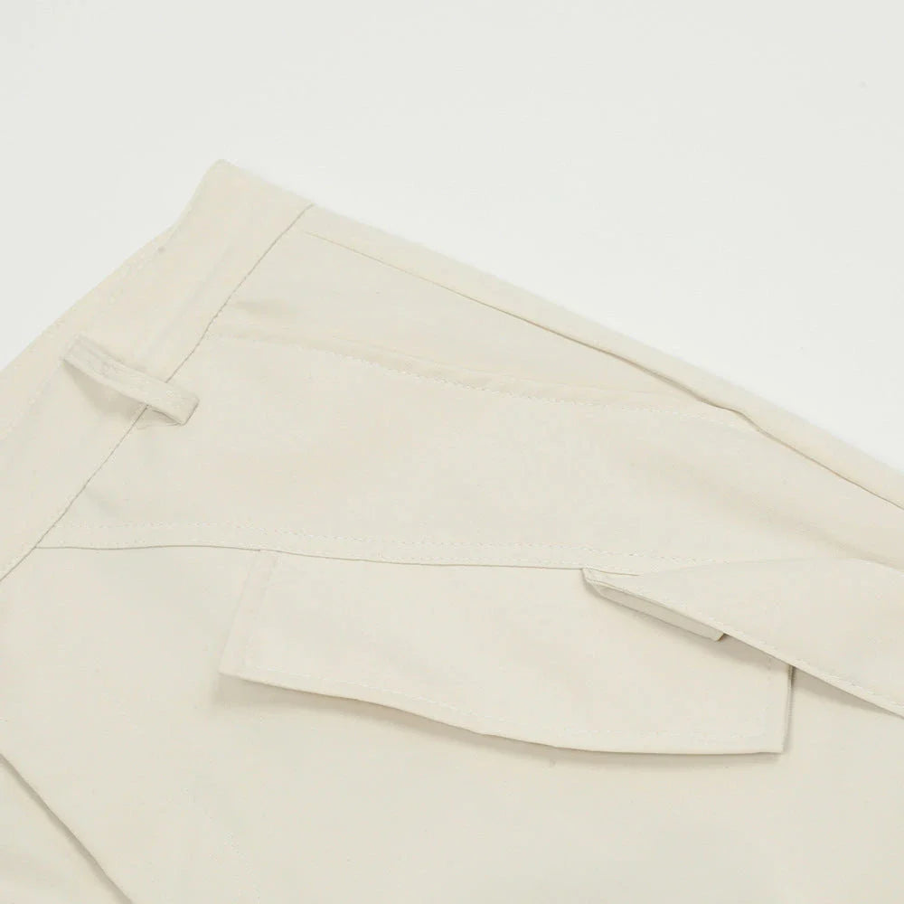 Stylish black overalls with pleated pockets, designed for the active Kiwi lifestyle