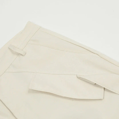 Stylish black overalls with pleated pockets, designed for the active Kiwi lifestyle