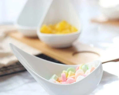 Stylish ceramic snack trays with natural wood pallet, perfect for serving nibbles and entertaining in Kiwi-style homes