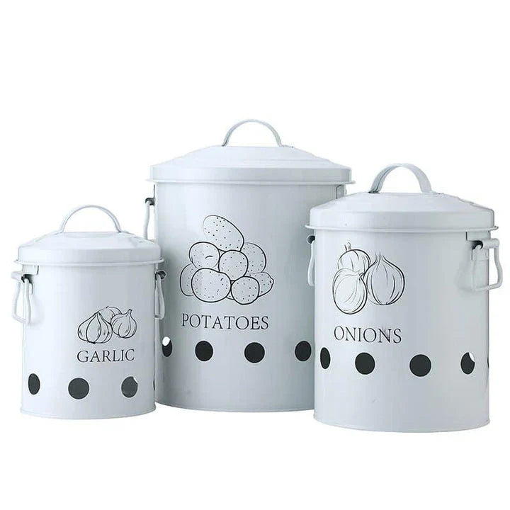 Breathable metal storage bins with handles for storing fresh produce like onions, potatoes and garlic in the kitchen.