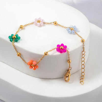 Vibrant, colorful flower-beaded stainless steel bracelet with adjustable chain and link design