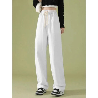 Elegant high waist wide leg pants in a versatile white color, perfect for the modern Kiwi woman's wardrobe.