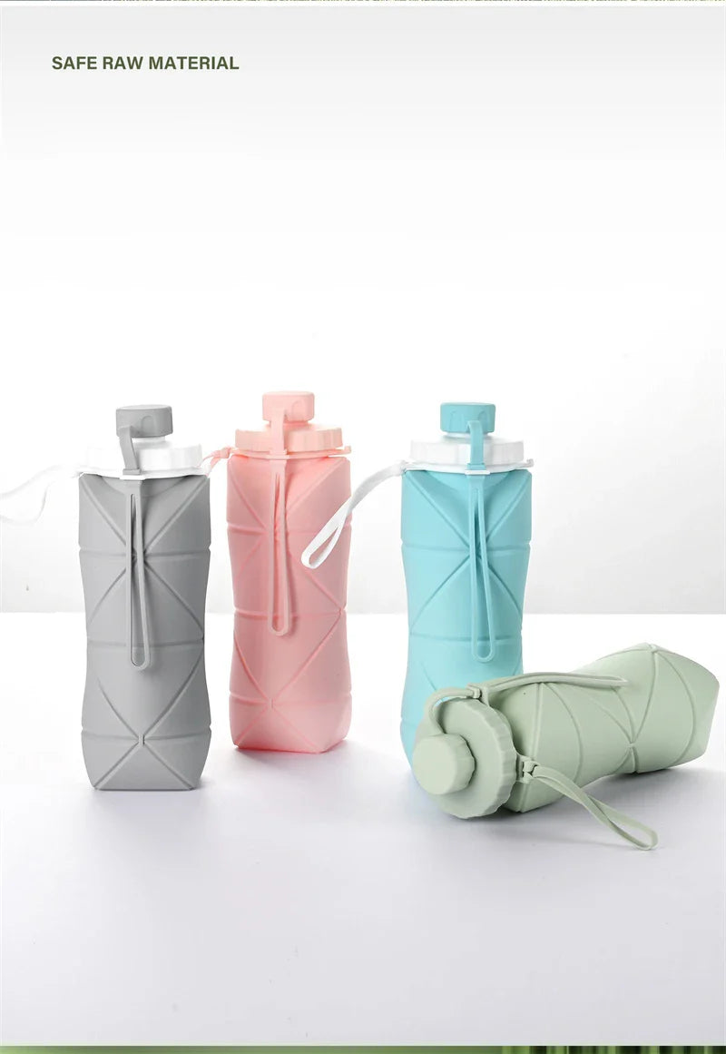 600ml folding silicone water bottle in green, pink, blue, and gray colors for outdoor sports and travel use